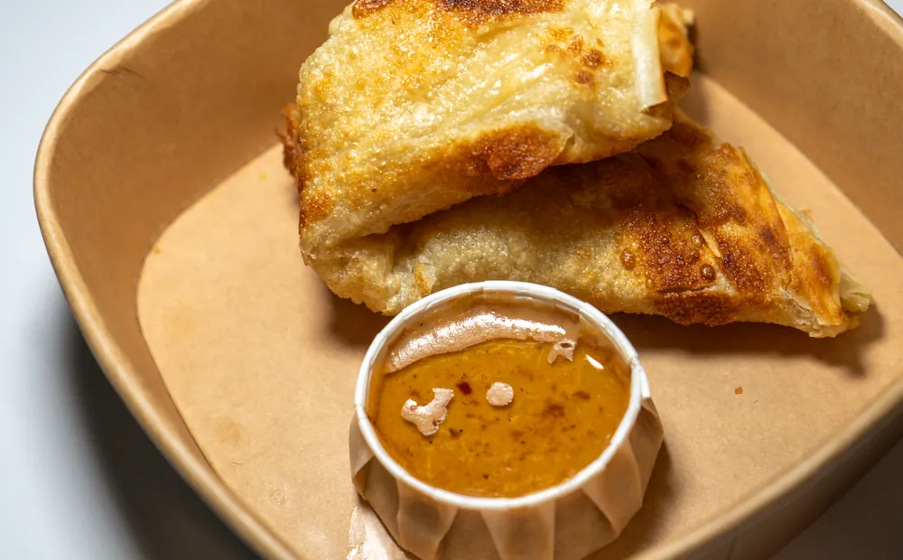 Roti canai with dipping sauce
